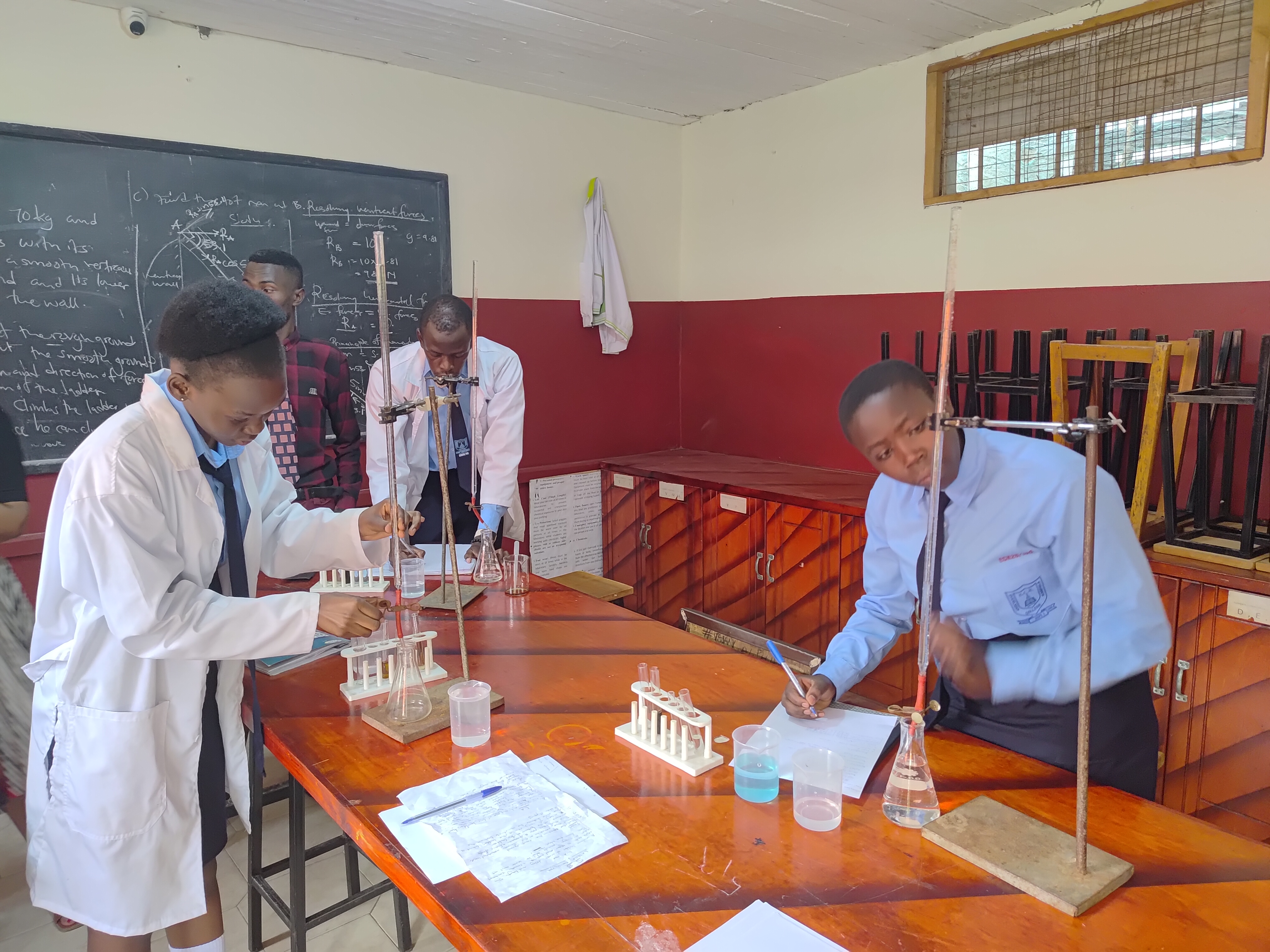 Students conducting a chemistry experiment.